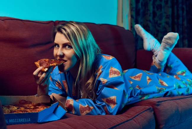 Domino's Made a 'Wipeable' Adult Onesie, So You Can Get Pizza All Over Yourself While Eating